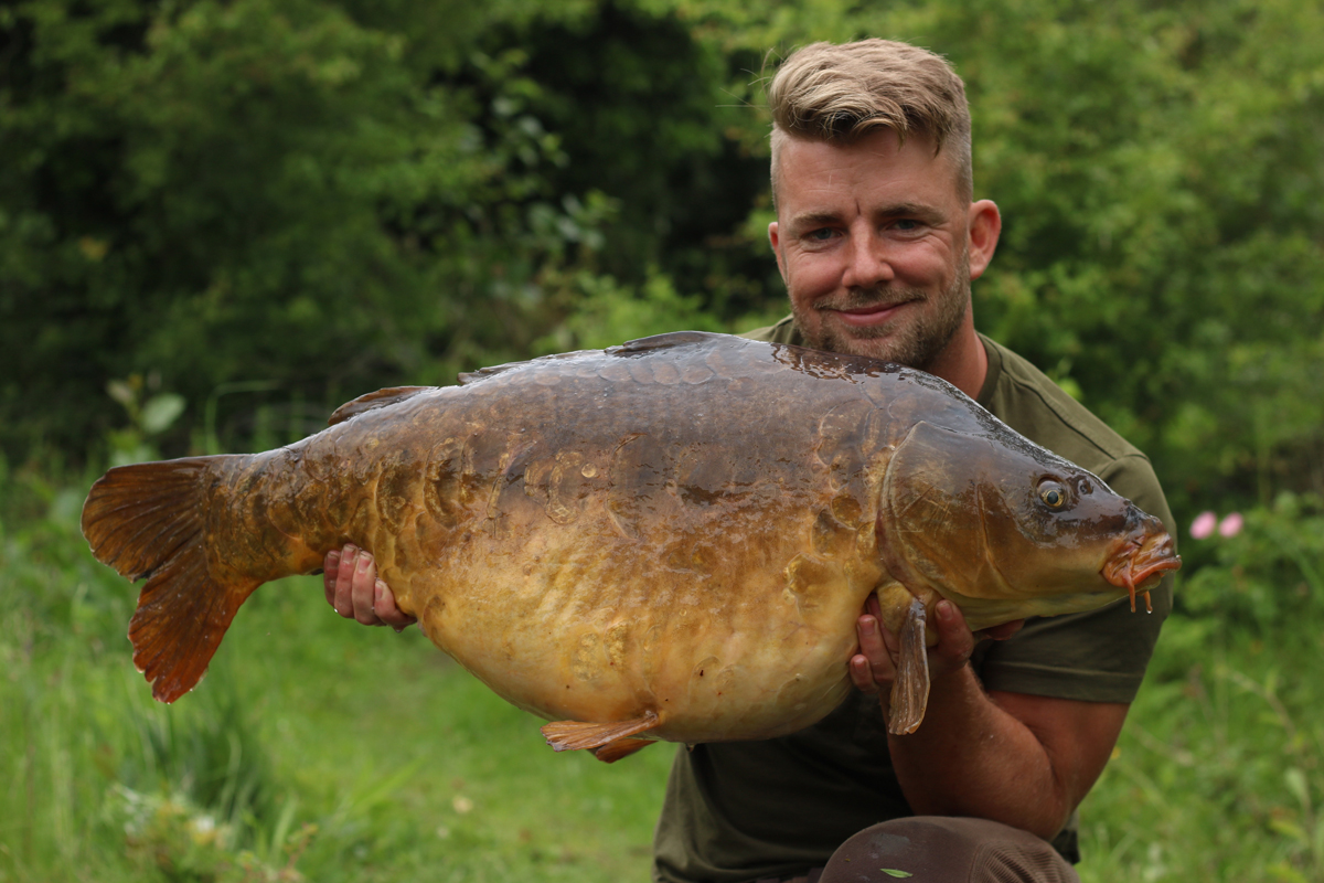 Jonny Fletcher Carp Angler catches big mirror Carp